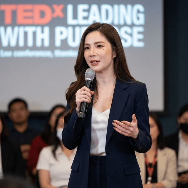 .A sophisticated professional woman with a narrow heart-shaped face, refined jawline, balanced facial proportions, expressive intelligent almond-shaped eyes, straight elegant nose bridge, subtle beauty mark on the right cheek, medium-length chestnut brown hair, graceful neck line, slim figure, executive presence, approachable yet authoritative.
2.Luxury female leadership aura.
3. TED keynote speaker presence.
4.Elegant and powerful without being aggressive.
5.Premium identity transformation mentor.
6.Not an influencer.
7.Not a celebrity.
8. Not a fashion model.
9.Looks like a successful entrepreneur, mentor and public speaker.