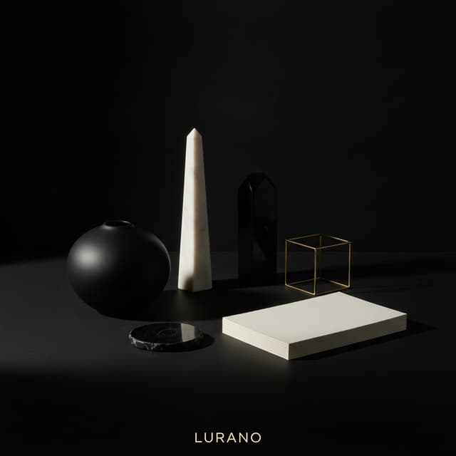 Crea una imagen cuadrada de lujo para una marca de comercio electrónico llamada LURANO.
La imagen debe representar visualmente el concepto “Selección cuidada”: productos cuidadosamente seleccionados, buen gusto, atención al detalle y una sensación de exclusividad.
Crea una composición artística y minimalista con varios objetos modernos y elegantes sin ninguna marca reconocible, cuidadosamente colocados sobre una superficie negra mate. Los objetos deben tener diferentes formas y tamaños, pero estar perfectamente equilibrados y organizados, como si alguien hubiera elegido personalmente cada pieza.
Utiliza exclusivamente una paleta de negro profundo, blanco marfil y pequeños detalles dorados.
El negro debe ser el color dominante. El blanco debe aparecer principalmente mediante una iluminación suave y elegante. El dorado debe utilizarse únicamente como pequeños reflejos metálicos, muy sutiles, nunca como grandes superficies doradas.
Añade una iluminación cinematográfica desde un lateral y desde arriba, creando sombras suaves y reflejos delicados sobre los objetos. Algunos bordes pueden captar una pequeña luz dorada para dar profundidad.
La escena debe transmitir orden, precisión, exclusividad y buen gusto, como una fotografía publicitaria de una marca de lujo.
El fondo debe ser negro, limpio y ligeramente profundo, sin elementos innecesarios.
Estilo: fotografía publicitaria de lujo, editorial premium, minimalismo sofisticado, iluminación cinematográfica, realista, elegante, moderno y atemporal.
Composición: cuadrada, equilibrada, con espacio visual alrededor de los objetos y sin que ningún elemento toque los bordes.
NO incluir: personas, manos, texto, letras, logotipos, marcas, nombres de productos, palabras, botones, precios, estrellas, galaxias, edificios o elementos decorativos excesivos.
IMPORTANTE: no debe parecer una fotografía genérica de catálogo ni una imagen de banco de imágenes. Debe parecer una campaña publicitaria exclusiva creada específicamente para LURANO.
Negro 75%, blanco/luz 20%, dorado 5%.
El resultado final debe hacer sentir: “Estos productos fueron elegidos cuidadosamente y hay buen gusto detrás de esta tienda.”Reducir drásticamente el dorado. Mantenerlo únicamente como pequeños reflejos metálicos. El negro debe dominar completamente la composición.