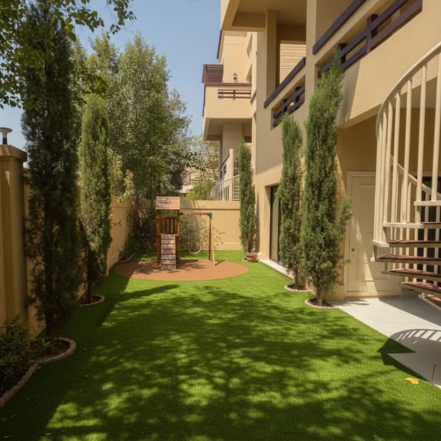 Using all **four uploaded photos as reference images of the same villa backyard**, redesign the outdoor space into a **modern, practical, family-friendly garden and kids’ play area suitable for Abu Dhabi’s hot climate**.
### Important: Preserve the Existing Property
* Keep the villa architecture exactly as shown.
* Do **not** change the exterior walls, windows, doors, boundary walls, staircase, spiral staircase, building dimensions, or existing structural elements.
* Maintain the actual proportions and dimensions shown in the photographs.
* Treat all four images as connected areas of the same backyard and create one consistent landscape design throughout.
### Ground Treatment
Replace the existing sand, gravel and unfinished ground throughout the usable backyard and side passages with **high-quality natural-looking artificial grass**.
The artificial grass should:
* Look premium and realistic rather than bright synthetic green.
* Be suitable for extreme UAE heat and direct sunlight.
* Run neatly along the villa walls and boundary walls.
* Include clean professional edging.
* Maintain proper drainage.
* Make the narrow side passages look finished, green and tidy rather than overcrowded.
### Kids Playground Zone
Use the larger open backyard area near the **white spiral staircase and existing trees** as the main children's playground area.
Create a clearly defined playground zone with:
* A **protective impact-absorbing rubber safety surface underneath the playground equipment**, rather than artificial grass directly underneath.
* The safety flooring should visually integrate nicely with the surrounding artificial grass.
* Rounded/soft transitions between the playground flooring and lawn.
* Enough safety clearance around the playground equipment.
* Keep circulation around the spiral staircase accessible.
For now, use a **tasteful medium-sized placeholder playground structure** appropriate for young children. Do not make the playground oversized because I will choose the final playground model later.
The future playground may include elements such as:
* slide
* swings
* climbing structure
* small playhouse/tower
The design should allow the playground equipment to be changed later without redesigning the whole garden.
### Trees & Landscaping
Use the **perimeter walls as the primary planting zones**.
Create narrow, elegant planting beds along selected boundary walls with **heat-resistant trees suitable for Abu Dhabi/UAE weather**.
The main purpose of these trees is to:
1. Provide additional shade over the artificial grass and children's play area.
2. Create privacy from neighboring villas.
3. Soften the appearance of the high yellow boundary walls.
4. Add greenery without consuming too much usable backyard space.
For now, use visually appropriate placeholder trees rather than committing to one species because I will decide the exact tree variety later.
The trees should:
* Have relatively narrow footprints.
* Grow vertically rather than spreading excessively into walkways.
* Have attractive green canopies.
* Be capable of handling extreme summer temperatures.
* Be positioned intelligently so their mature canopy can provide shade.
* Not block windows, pathways, stairs or access areas.
* Avoid excessive roots close to the villa foundations.
Retain healthy existing mature trees where practical and integrate them naturally into the new landscaping.
### Side Passages
For the long narrow passages between the villa and boundary walls:
* Cover the ground primarily with artificial grass.
* Keep them simple, clean and spacious.
* Add selective narrow planting along the boundary wall only where sufficient width exists.
* Do not overcrowd these passages with trees, furniture or decorative objects.
* Maintain a clear walking route from front to back.
### Landscape Style
Use a **modern upscale Abu Dhabi villa landscape aesthetic**:
* clean
* minimal
* elegant
* family friendly
* lush without being overcrowded
* practical for UAE weather
* low maintenance
Avoid a tropical jungle appearance.
Use landscaping that feels realistic for a private villa rather than a resort or public park.
### Optional Details
Where appropriate, subtly incorporate:
* concealed warm landscape lighting beneath trees or along planting beds
* simple irrigation lines hidden within the landscaping
* clean borders between grass, planting beds and rubber playground flooring
Do not add excessive decorative stones, fountains, swimming pools, pergolas or large outdoor furniture unless they already logically fit within the available space.
### Final Visualization
Create a **photorealistic renovation concept** using each original photograph as the camera viewpoint.
Show how the exact same space would look after landscaping while retaining the original architecture and perspective.
The final result should clearly show:
* artificial grass covering the currently unfinished ground
* dedicated rubber safety flooring underneath the kids playground
* playground positioned in the larger open garden area
* strategically planted shade/privacy trees along the perimeter walls
* existing trees integrated where suitable
* clean landscaped side passages
* a cohesive design across all four reference images
Make the result **construction-realistic and achievable**, not an architectural fantasy rendering.