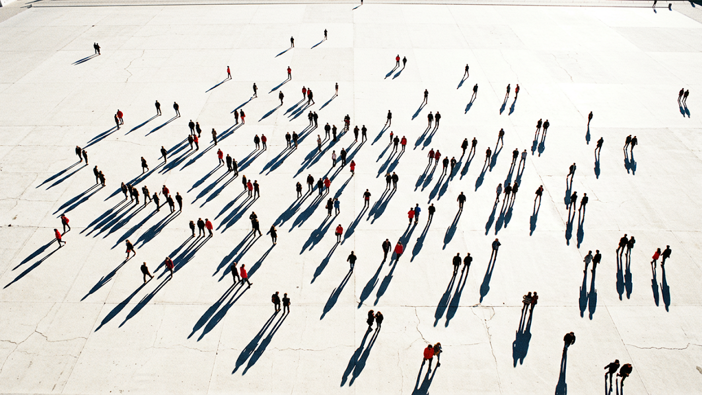 Nano Banana Pro — High-angle aerial composition, white plaza with scattered figures, cinematic depth